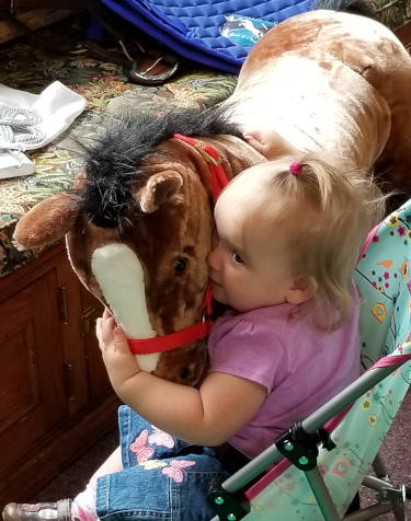 Micro loves hugging children...