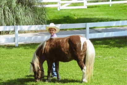 North Carolina Fan Club - A young cowboy with Itty